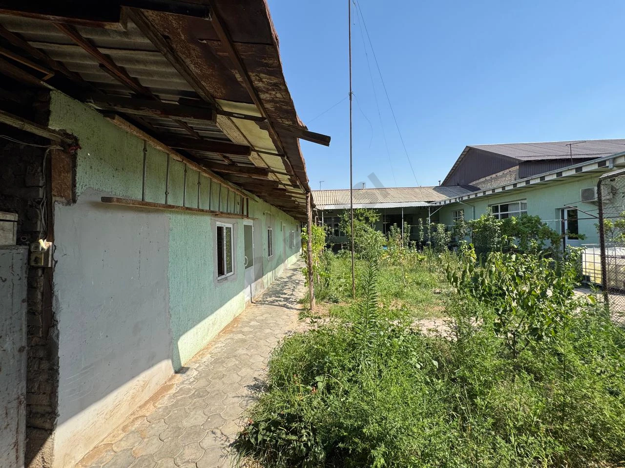 Land plot in Qibray, General Sheraliyev mahalla - Cover Photo